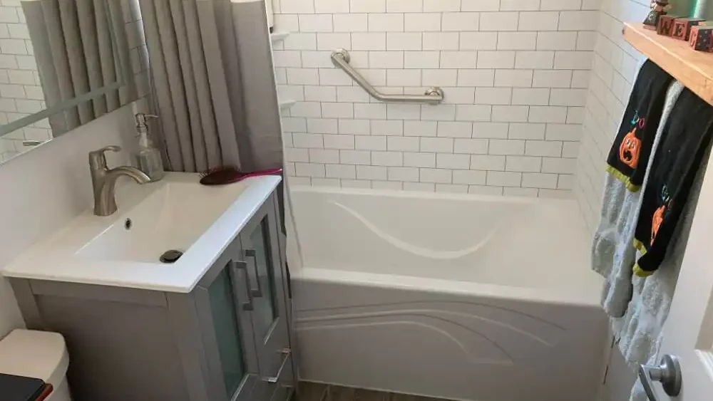 shower tub combination with shower grab bar and shower curtain